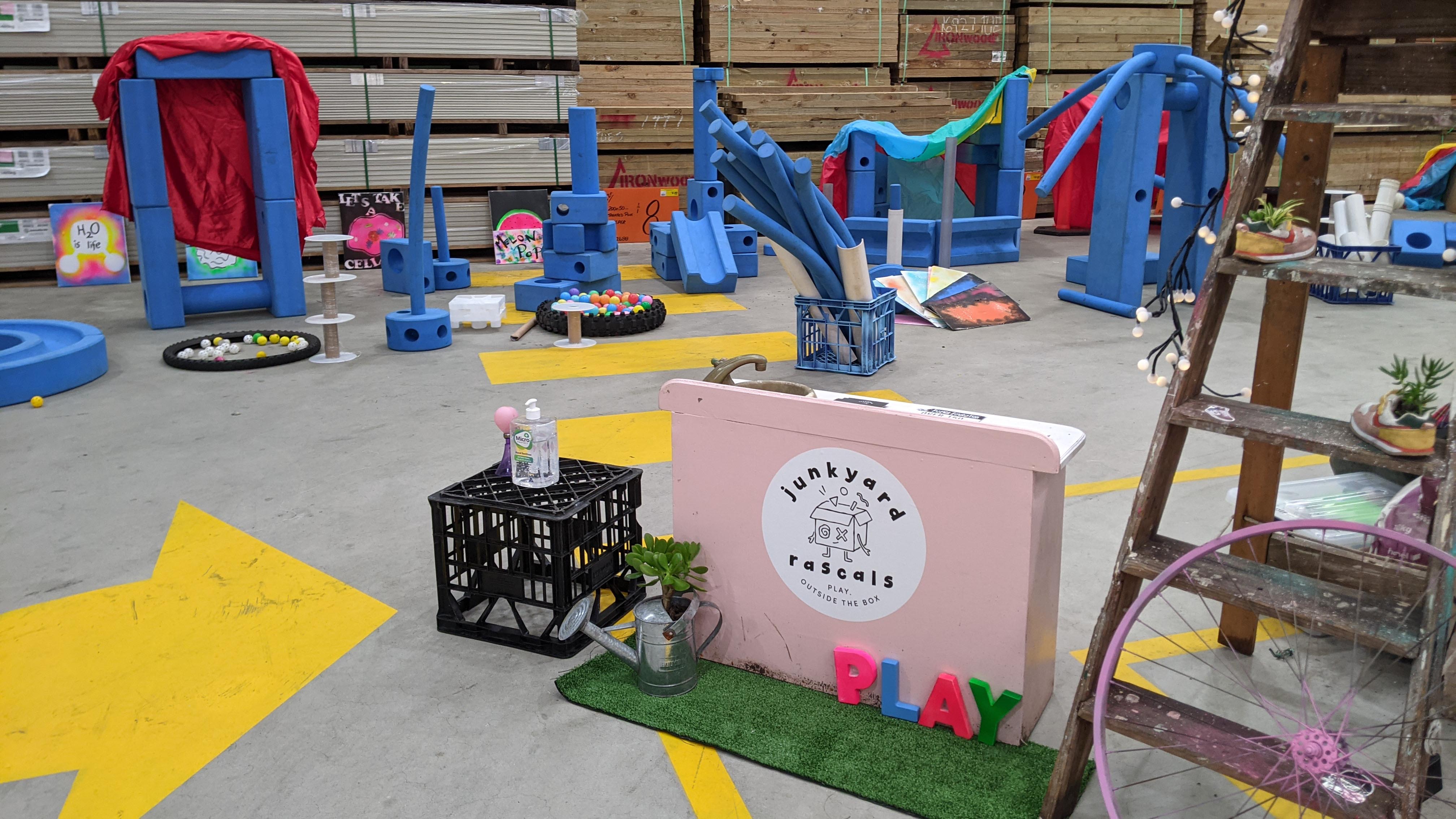 inside a warehouse with play equipment